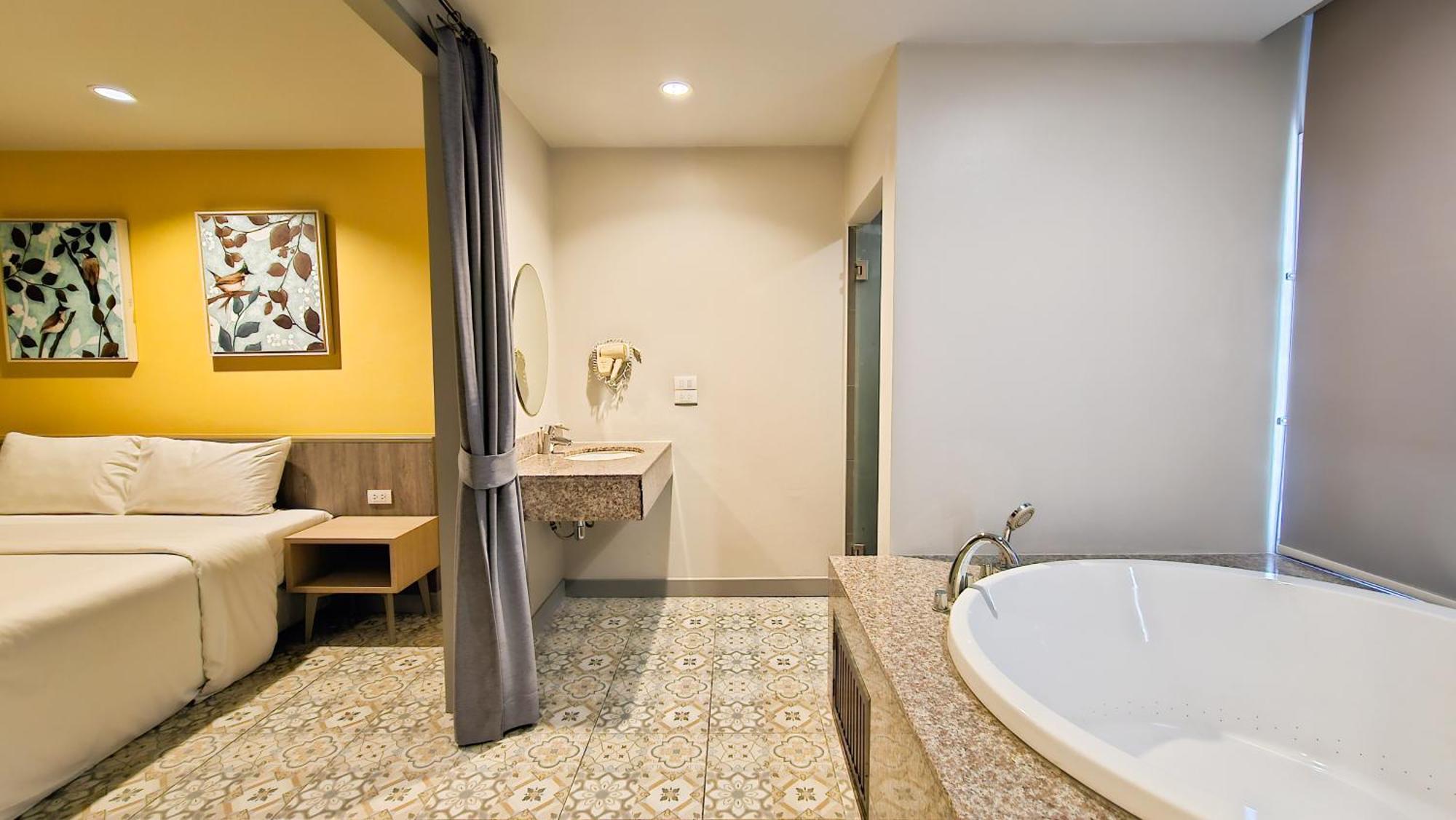 Quarto Duplo com Banheira de Hidromassagem